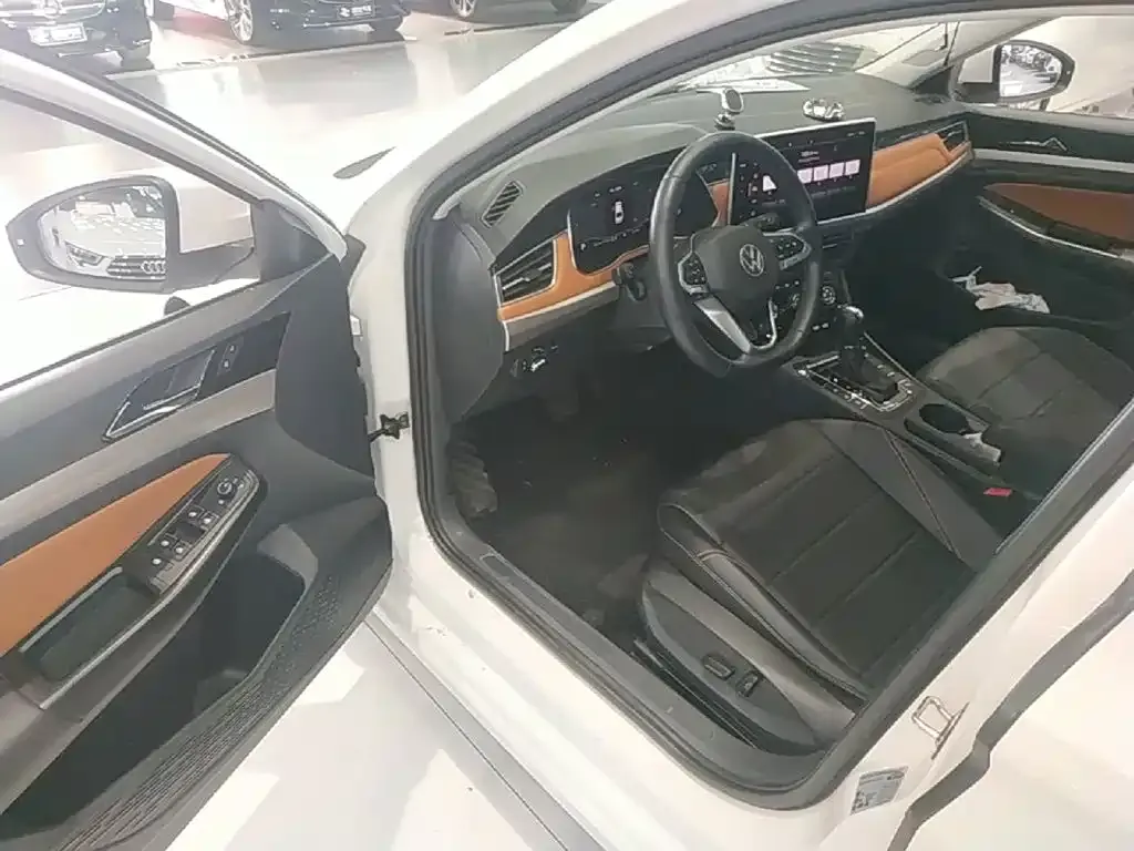 Volkswagen Bora 200TSI DSG Yuexing PRO Edition 2022 — фото 15